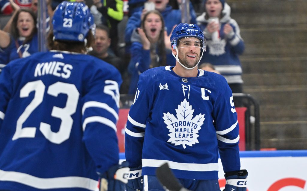 Oct 2, 2023; Toronto, Ontario, CAN;   Toronto Maple Leafs forward John Tavares (91) celebrates with forward Matthew Knies (23) after scoring a goal against the Montreal Canadiens in the third period at Scotiabank Arena. Mandatory Credit: Dan Hamilton-USA TODAY Sports